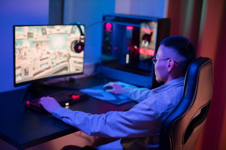 a young man intensely gaming on a computer at home showcasin